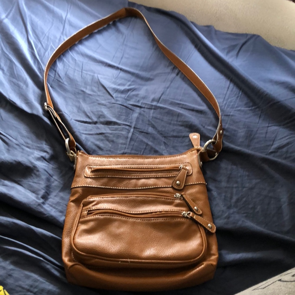 Medium sized brown or tan crossbody purse